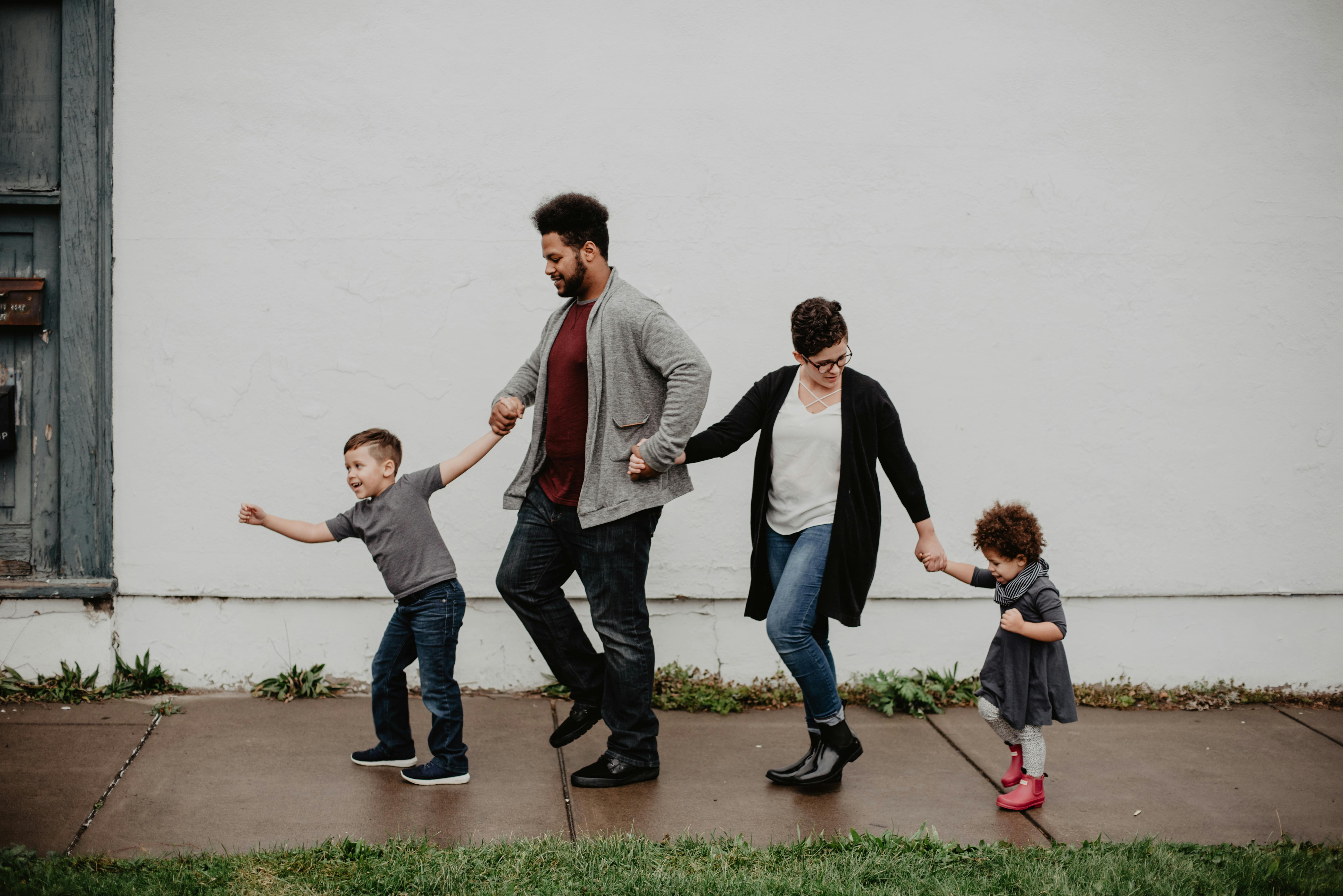 Parents interacting lovingly with children
