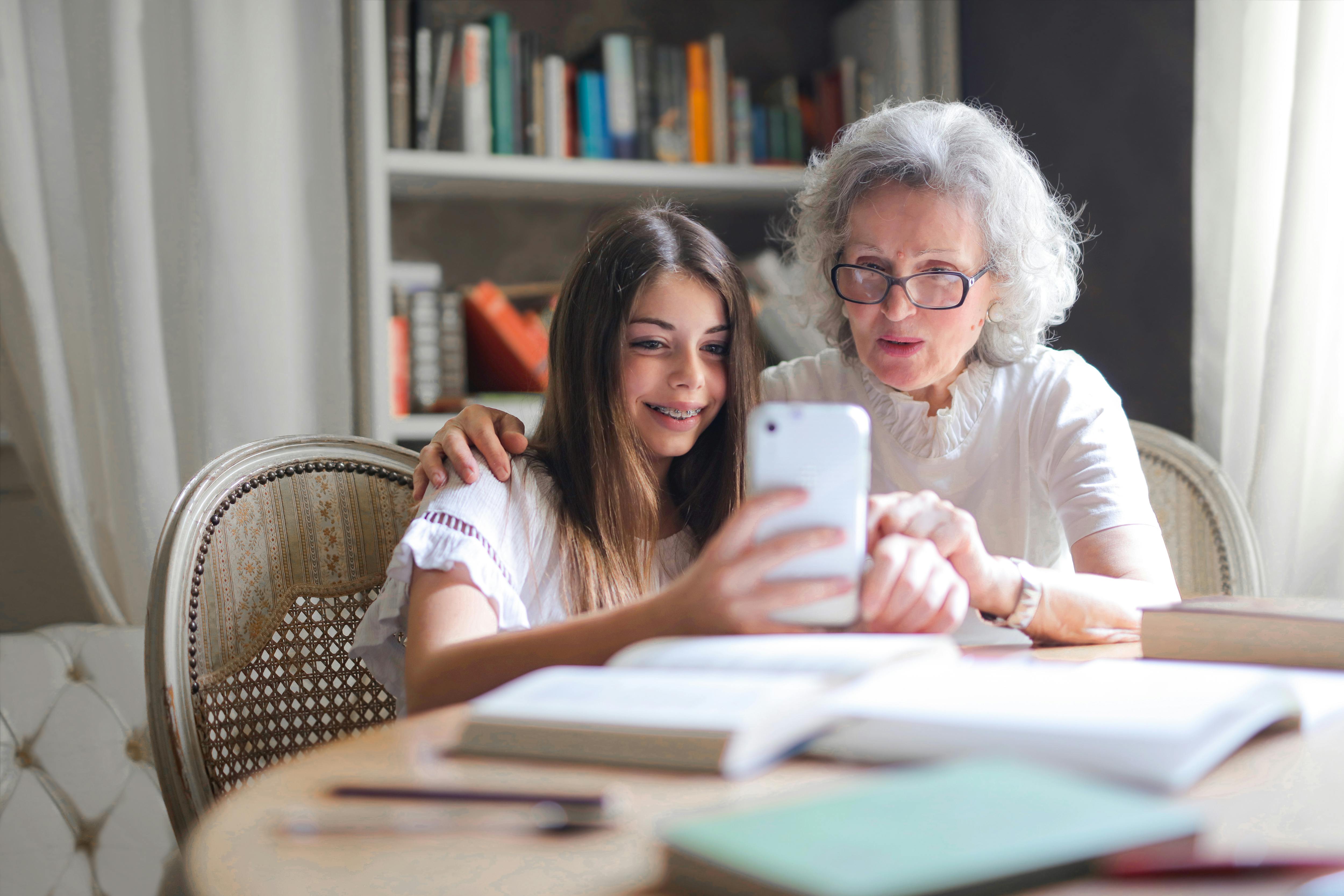 Senior family members sharing stories and engaging with younger generations